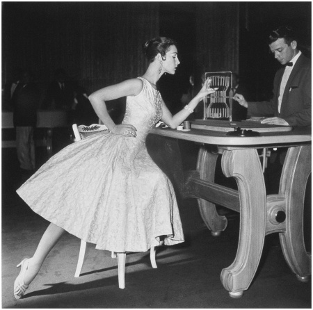 A fashion photo that Roger Prigent took in a casino in the Dominican Republic, from Vogue magazine in the mid-1950s